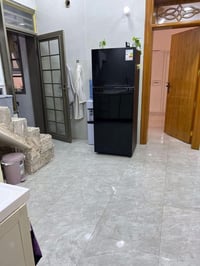 الكوفة السهيلية • ١٠٠م • واجهة ٥ ونص