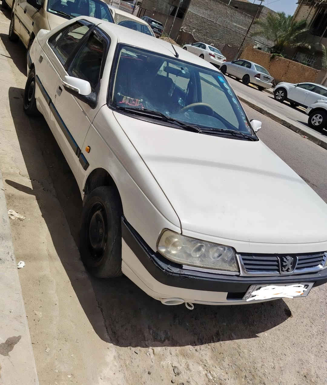 السلام عليكم بيجو 405للبيع رقم بابل مكاني نجف شراي يتواصل ***********
