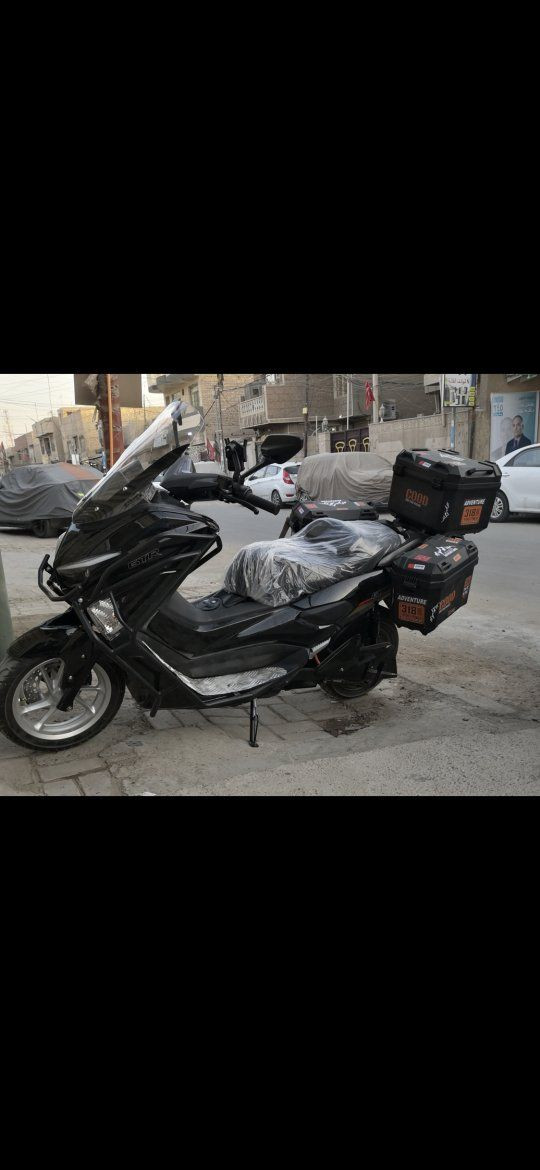 دراجة شحن nmax  ملف 2500 واط من شركة shinwin افضل شركة محركات صينية بطارية ليثيوم 72فولت السرعة 95كم الشحنة الواحدة تمشيك 90كم دراجة تحفة بمعنى الكلمة السعر 1,800مليون وثمنمية بغداد ***********
