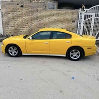 جارجر مديل 12 رقم نكليزي مصفره هيه ومرورخط نعمانيه بغداد  وسنويه 27  ج...