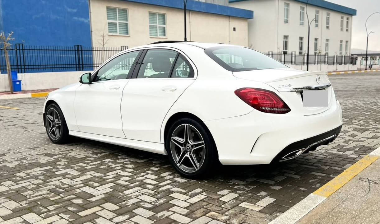 السعر مناسب جداً قياساً بالجدادة والنظافة استخدام شخصي
Mercedes Benz C300 AMG موديل 2020 
عداد المسافة: 50 ألف
رقم السيارة: أربيل تحويل بشرط

ال💎ــسعـر 🟥 :: رقم (1) تلـقـائـي 📮

مواصفات وتفاصيل السيارة:
فتحة سقف (سلايد روف)
المحرك: 2.0 لتر توربو – 4 سلندر
ناقل حركة 9 نمر
شاشة معلومات وسطية بحجم كبير

تحكمات كاملة على الستيرن
نظام ملاحة (Navigation) + CarPlay
حساسات أمامية وخلفية + كاميرا خلفية
مقاعد جلد أسود ودشبول مطعم بالصاج

نظام تثبيت سرعة مع رادارات أمامية 
وخلفية وجوانب تشغيل بصمة 
مع نظام دخول ذكي لجميع الأبواب

تدفئة ستيرن + أنارة محيطية (64 لون)
بصمة أبواب مع بصمة فتح وغلق الجنطة
كشنات أمامية تدفئة مع نظام خزن (ميموري)

كشنات أمامية كهربائية
صندوق كهرباء + 5 أنظمة قيادة
لايتات ليد (8 عدسات) + بك لايت ليد

شحن وايرلس (Auto)
سستم سماعات Burmester
نظام Auto Stop + Auto Hold
هيكل AMG بلادي شركة

ويل كب حجم 18 مع تخم تايرات دنلوب لوك
عدة الإسعافات، الهوك، الجنطة، 
واللوحة موجودات

السيارة حادثة حادث سطحي: 
جاملغ أمامي أيمن ربعه مبدل ومبخوخ، 
مع جاملغ خلفي أيمن وشوية من الباب الخلفي 
مسوي مباوك فقط، بدون تعديل بارد، 
بدون شخوط، وبدون أي إيرباك 

(كلها سليمة على وضع شركة)
السيارة مسويلها بوليش وتشميع

السيارة بدون أي خلل، كير ومحرك وحدادية بشرط والكهربائيات شغالة، ومسويلها سيرفس دهن وفلاتر ومي راديتر (أنتي فريز) وبدون أي نقص 
موقع السيارة بغداد حاليا

رقم صاحب ســـيـارة :: ***********
