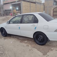 لانسر للبيع 2006 مزاد وزارة الداخلية السياره نضيفه داخل وخارج كير ومحر...