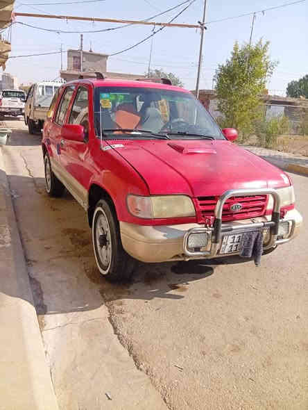 كيه سبورتج موديل ٩٦  .....للبيع لون احمر رقم دوالي بغداد تحويل ثاني يوم مكفول من ضربه والكصه والكلبه بيه ماكان تكحيل اهلالات بصيطه محرك امسكر حال جيده كير عادي حال جيده تخم تاير خط ابيض تبريد فول منضومه جديده سياره احلا من الصوره دواخل حلوه دوشمه حلوه فقط طوافه بانزين عاطل السعر 48 او بيه مجال عنوان كوت نعمانيه رقم الهاتف ***********

