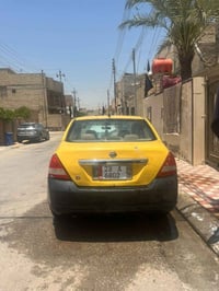 سياره البيع نيسان تيدا موديل 2008بسمي مصفره هيه وغرامات سياره حلوه وتخ...