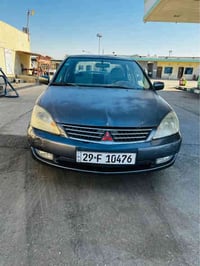 للبيع لانسر 2007 محرك 2000 السياره بلاديه بس بيه جراد كير ومكينه خير م...