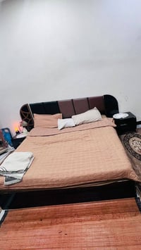 أسِرّة • حي الحسين • شارع الخدمي