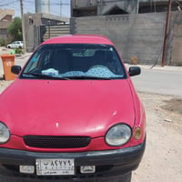كورله موديل ٩٨ لون أحمر مصبوغة عام جماليه مكفولة  رقم بغداد شرط التحوي...