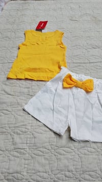 ملابس أطفال • توصيل