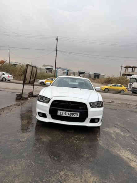 السلام عليكم للبيع دودج تشارجر بها قطعتين مكلف بالنشر 2012 بيها بوند وكامل بدون دواخل سياره حيل حلوه رقم نينوى  بيها صبغ قطعتين بدون دواخل بوند وشاملغ جير مكينه اكسن كله شرط السعر سعر 160 وبيها مجال شيء بسيط كاربون***********
