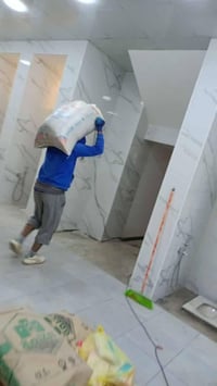 النجف • تصعيد مواد • صب أرضيات