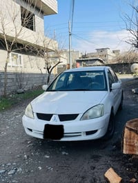 لانسر • ٢٠١١ • اوتوماتيك