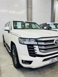 لاندكروزر 2022 GXR توين تيربو  ساس باب وال  رقم بغداد بأسمي  تطبيق سبع...