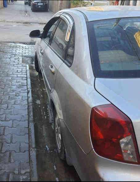 بغداد حي القاهرة
دايو لاسيتي شبيهة الاوبترا لون سلفر رقم بغداد موديل ٢٠٠٨ كير ومحرك ممتاز تدفئة وتبريد بدون ضربه وصبغ نظيفة جدا 
السعر ١١ مليون عراقي وبيه مجال
رقم الهاتف ***********
