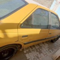 بيجو405 بسمي سنويه لل2028 مصفره هية+غرامات تبريد ثلج.مكينة +گير خير من...