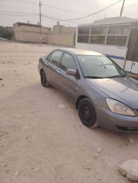 ميسي بوشي مديل 11.بيها قطعتين. سياره حلوه ونضيفه. مثل ماشوفون ب صور. م...