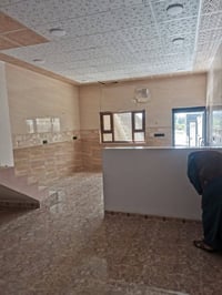 ١٠٠م • أرضي • قرب مسجد لؤي العزي