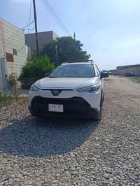 كورلا كروز هايبرد 2025 وارد امريكي  رقم بغداد هايبرد بصمه تشغيل عن بعد...