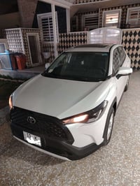 للبيع كورلا كروز وارد صيني هايبرد موديب 2025 محرك 2000 فتحة سقف تبريد ...