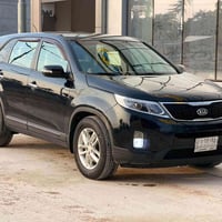 سورنتو ٢٠١٤ • ماشي ٩٦ ألف ميل • باقي كفالة