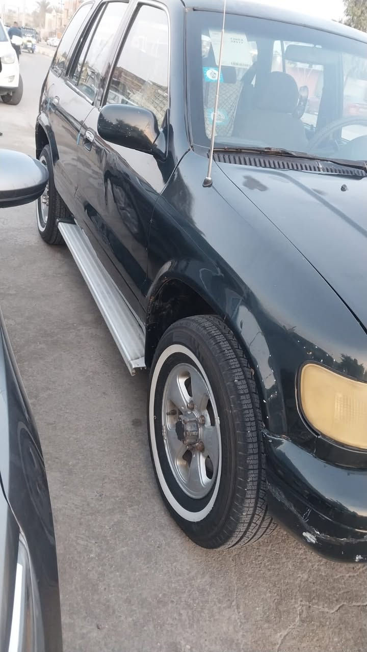 السلام عليكم
كية اسبورتج موديل ١٩٩٣
رقم بغداد أنكليزي السيارة 
جاهزة بيهة نقوصات كماليات 
بس كير مكينة خير من الله 
مكينة 2000 مفتوح مو مسكر كير عادي 
بيهة تخم تاير جبلي جديد صدر نضيف 
ترهم مراوس هم شعندك تعال خاص 
رقمي ***********
