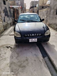 سوناته 2000 رقم دولي بغداد محرك كير تخم تاير باتري كله جديد كهربايات ك...