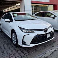 كورلا 2025  HEV زيرو علامه سوده شكل خليجي   المواصفات  🛜مكينه 1800 هاي...