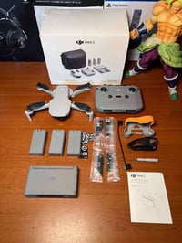 Dji mini 2 combo  قطعه اخت الجديده استخام كلش بصيط كل ملحقات كامله  3 ...