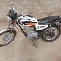 موتوسيكل • أوراق أصلية • كوت