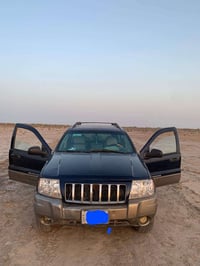 جيب شيروكي موديل ٢٠٠٤محرك ففيتي رقم بغداد مشروع وطني السعر ٦٢ ٠٧٧١٥٩١٩...