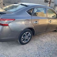 نيسان سنترا 2016 خليجي محرك 16 رقم بغداد دولي بأسمي كير محرك شرط ضررها...