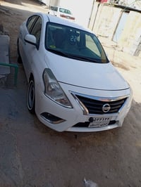 نيسان صني 2019 سنوية منتهية بيها ضربة بجاملق الخلفي  (معمر) وبعض الملا...
