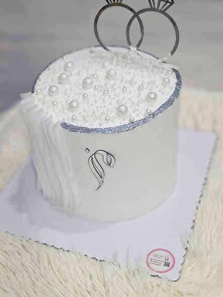 كيــكات عقد قران حسب الطلب 💍👩🏻‍❤️‍👨🏻🫂✨… يُصنع لكم بكُل حُب ❤️متوفر حروف اكريليك وورق الويفر 🫰🏻🤍…
للحجز والاستفسار مراسلة الصفحة او واتساب *********** 
بالحجز قبل يومين ع الأقل لطفاً …يتوفر توصيل لجميع مناطق الديوانية #كيكة_عقد #خطوبة #مشية #تجهيز #الديوانية #كيك
