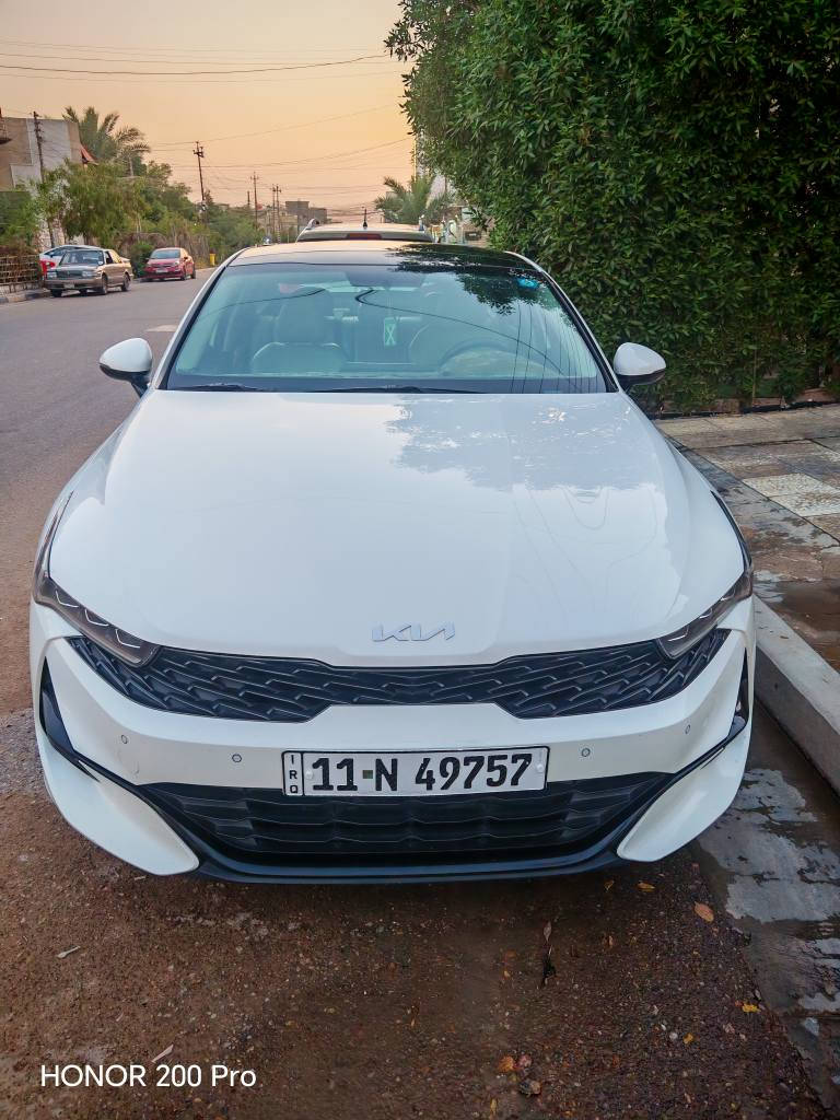 السلام عليكم . كيا k5 2023 وارد خليجي اعلى مواصفات بالخليجي EX فول مواصفات محرك 2000 دوش بانوراما بصمة تشغيل وابواب بردات خلفية شاشة كامرة دوارة دشبول صاج ويل كروم مري قلاب وية البك كراسي السائق ولصدر كهرباء كشنات جلد خزن ميموري وبعد هواي مواصفات مذاكرهن رقم بغداد بسمي ماشية 71اسبير منازل وكتلوك الشركة موجود السيارة مكفولة من تبديل ولصبغ 
بارد بيه شي بسيط
 مكان السياره بغداد  حي الجهاد 
 *********** بغداد, العراق
