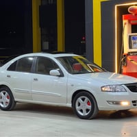 موديل ٢٠٠٦ • مقاعد جلد • فتحة سقف