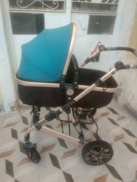 عربة طفل • للبيع
