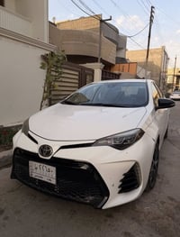 كورلا 17 se بغداد حره  ماشيه 160 الف  الضرر قطعتين خلفيه الصندوك والجا...