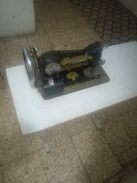 مكينة خياطة • فراشة • بابل