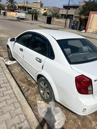 اوبترا 2014 رقم بغدادقطعتين صبغ بدون دواخل سعر80 وبيه شي بسيط 07712329...