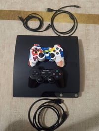 PS3 Slim • مهكر • يدتين