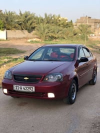 وبترا 2005كير عادي رقم بغداد السياره جاهزه من كلشي حد اديه صدر تبريد ك...