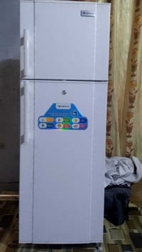 ثلاجة 12 قدم • شغالة • ضمان