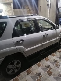 سبورتج • ٢٠١٠ • فتحة سقف