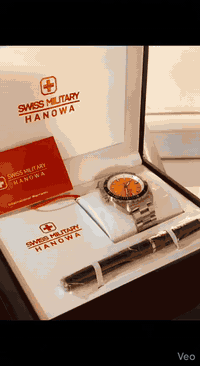 Swiss Military Hanowa • حركة أوتوماتيك • مينا برتقالي