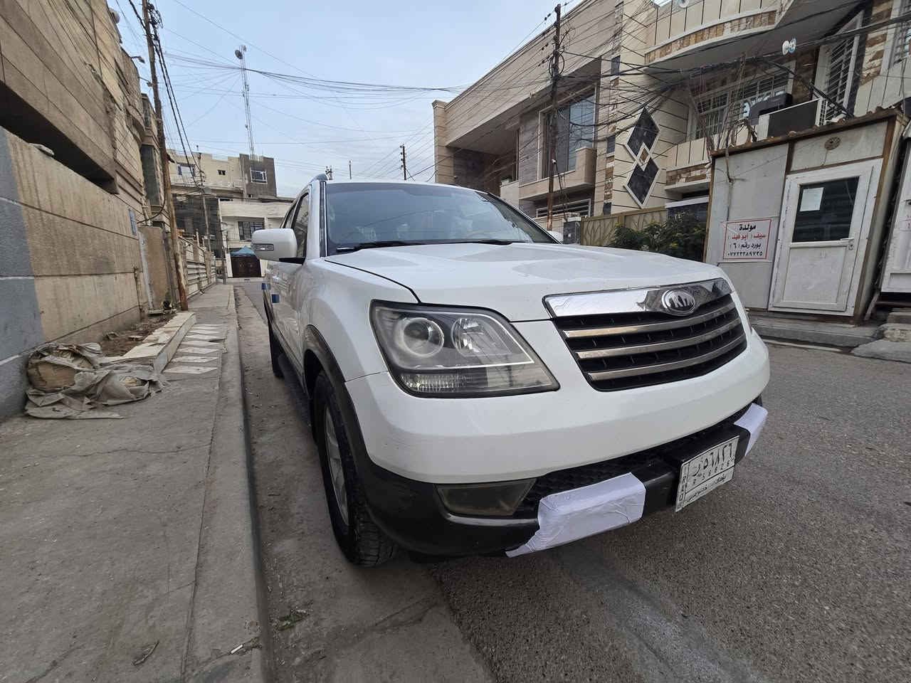 كيا مهافي خليجي موديل ٢٠١٣ رقم بغدادا ألماني تحويل مباشر سلايت محرك ٦سلندر سبعه راكب تبريد ٣قطع  فور ويل فوول تحكمات داخل صاج مري شفط اشاير بلمري جنطه  كهرباء تبريد شاشه بيه مكانات صبغ ابيع مصبوغه السعر 103 الاتصال ***********
