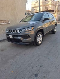 جيب كومباس 2023 فئة الايتود   لون سمنتي ((بدون رقم تترقم جميع المحافظا...