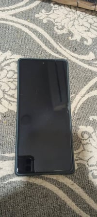 انفنكس نوت 50  ذاكرة 256 شحن سريع كامل ملحقاتة شاحنتين لاسلكي سماعه وب...