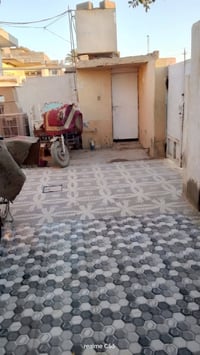 دار للبيع مساحة 250 تجاوز في بعقوبة كاطون الرزاي شارع المدارس يحتوي عل...