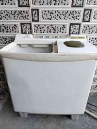 غساله باله هيتاشي الأصلي سعره 80 تغسل وجفف بطانيه حجمه كبير 0787999118...