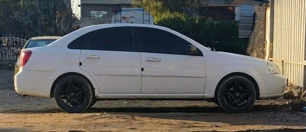 2005 موسسة بدون ضرر بدون صبغ بدون حادث كير عادي محرك وكير شرط هزه جديده ) ***********
