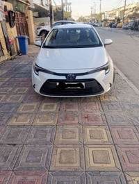 ورحمه الله كورلا هايبرد وارد امريكي LE موديل 2024 ماشية 60 الف   سياره...